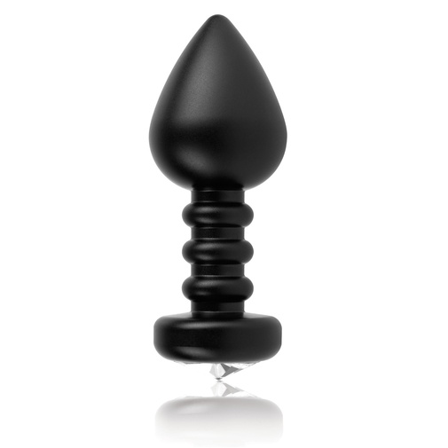 Fekete színű fém análkúp bordázott felülettel, szűkített csúccsal a könnyű behelyezés érdekében, az alján egy nagy méretű kő található